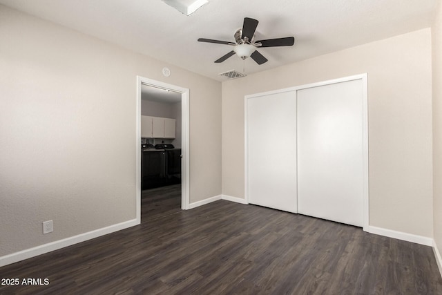 6022 E Colby St, Mesa, AZ 85205 - unfurnished bedroom featuring dark wood finished floors, a closet, and a ceiling fan