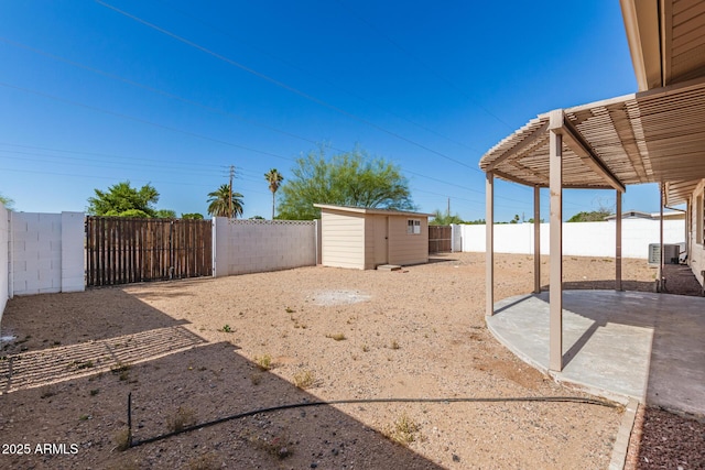 6022 E Colby St, Mesa, AZ 85205 - fenced backyard featuring a patio area and a shed