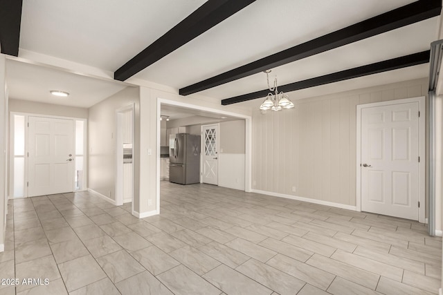 6022 E Colby St, Mesa, AZ 85205 - unfurnished living room featuring a chandelier and beam ceiling