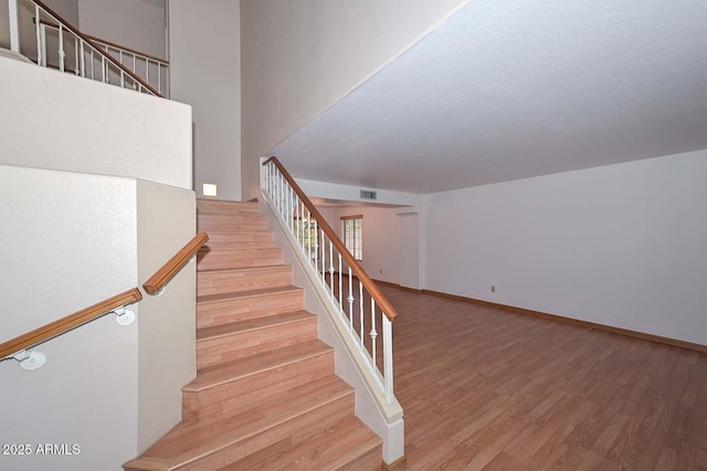 6928 W Oraibi Dr, Glendale, AZ 85308 - stairs with wood finished floors