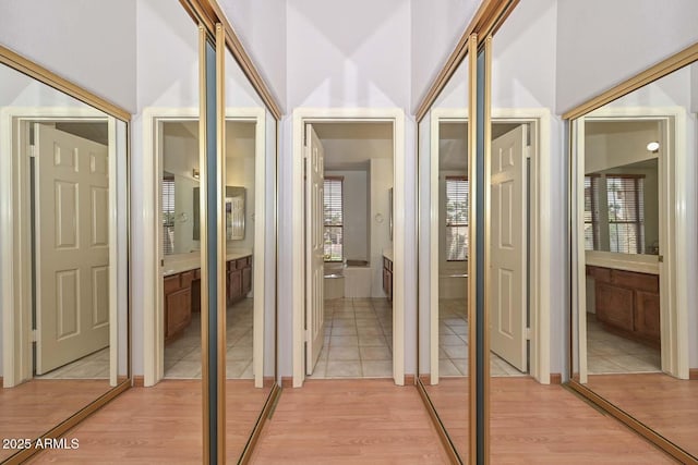 6928 W Oraibi Dr, Glendale, AZ 85308 - corridor featuring light wood finished floors