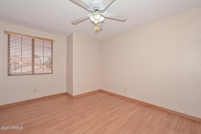 6928 W Oraibi Dr, Glendale, AZ 85308 - spare room featuring light wood-type flooring, ceiling fan, and baseboards