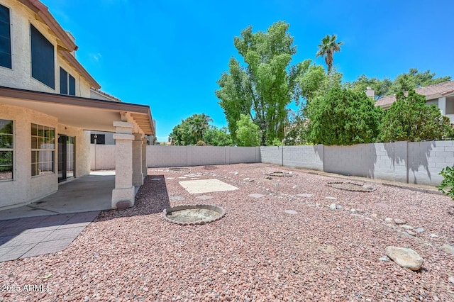 6928 W Oraibi Dr, Glendale, AZ 85308 - fenced backyard with a patio area