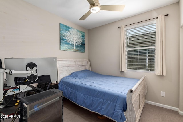 carpeted bedroom with baseboards and ceiling fan