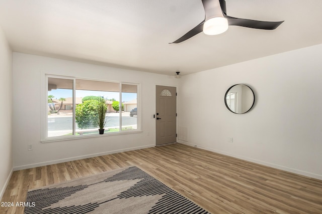 interior space with hardwood / wood-style flooring and ceiling fan