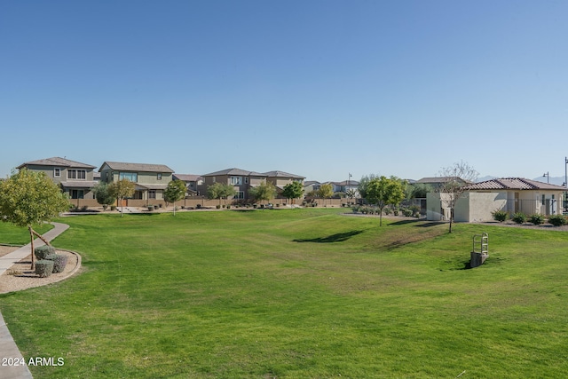 view of community featuring a yard