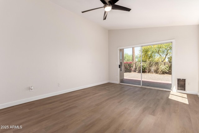 4526 E Bannock St, Phoenix, AZ 85044 - spare room with a ceiling fan, wood finished floors, baseboards, and lofted ceiling