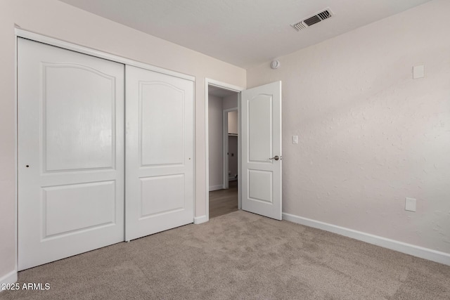 4526 E Bannock St, Phoenix, AZ 85044 - unfurnished bedroom featuring carpet flooring, baseboards, and a closet