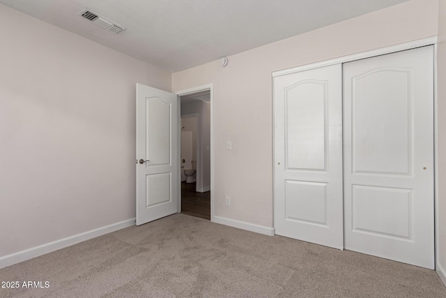 4526 E Bannock St, Phoenix, AZ 85044 - unfurnished bedroom featuring carpet, baseboards, and a closet