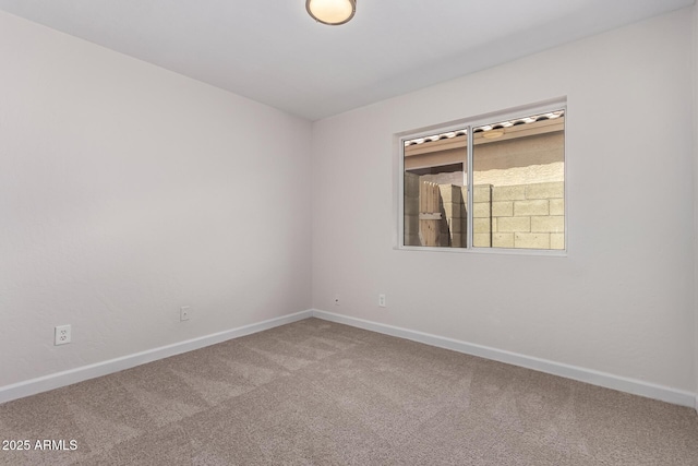 4526 E Bannock St, Phoenix, AZ 85044 - empty room featuring carpet floors and baseboards