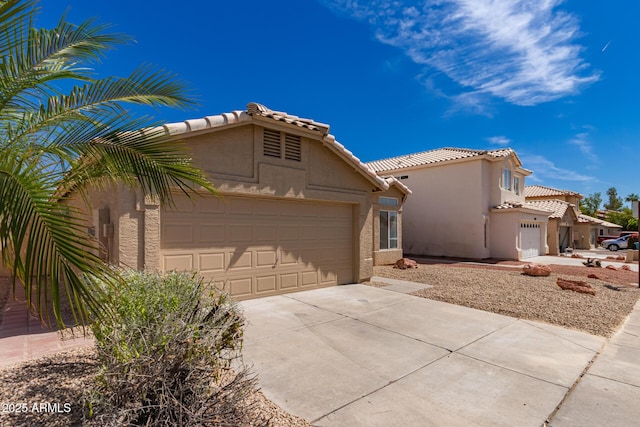 4526 E Bannock St, Phoenix, AZ 85044 - view of front facade featuring stucco siding, an attached garage, driveway, and a tiled roof