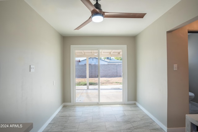 doorway to outside with ceiling fan