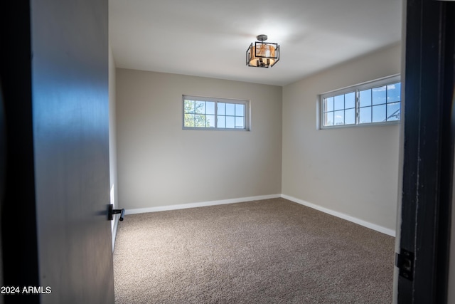 unfurnished room with carpet