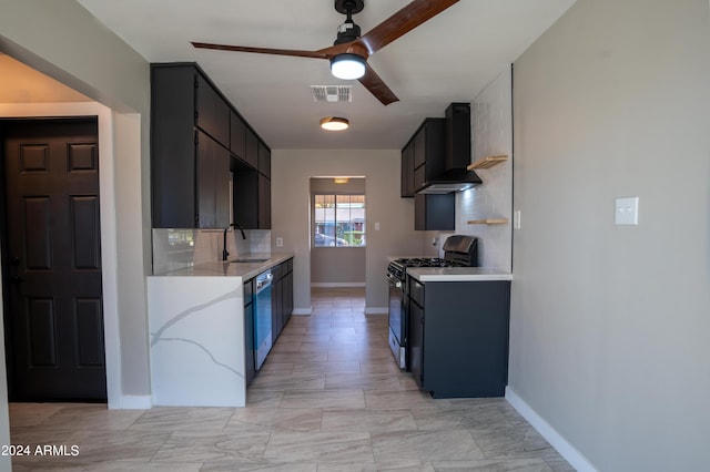 kitchen with backsplash, stainless steel appliances, ceiling fan, sink, and wall chimney range hood