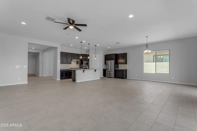 22788 E Orion Way, Queen Creek, AZ 85142 - unfurnished living room featuring a ceiling fan, recessed lighting, and light tile patterned floors