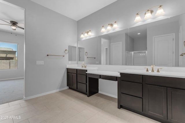 22788 E Orion Way, Queen Creek, AZ 85142 - bathroom with ceiling fan, double vanity, and a stall shower