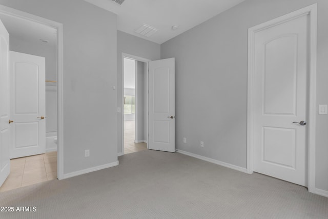 22788 E Orion Way, Queen Creek, AZ 85142 - unfurnished bedroom featuring light colored carpet and light tile patterned floors