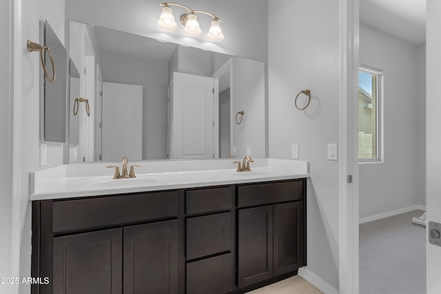22788 E Orion Way, Queen Creek, AZ 85142 - full bathroom with double vanity and baseboards