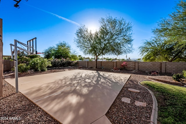 view of patio with basketball court