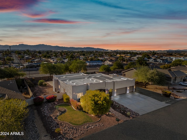 aerial view at dusk with a mountain view