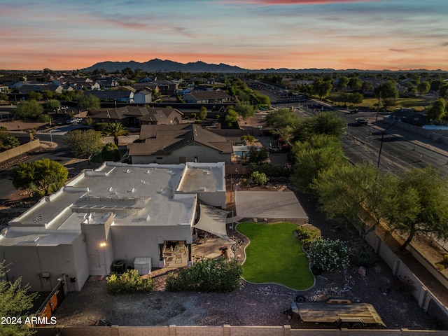 aerial view at dusk with a mountain view