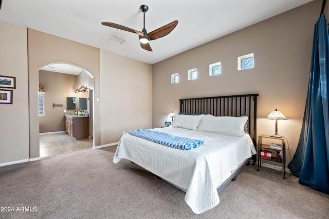 bedroom with light carpet and ceiling fan