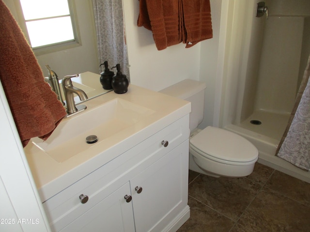 bathroom featuring walk in shower, tile patterned floors, vanity, and toilet