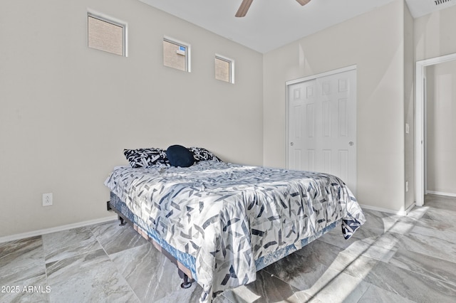 bedroom featuring a closet and ceiling fan