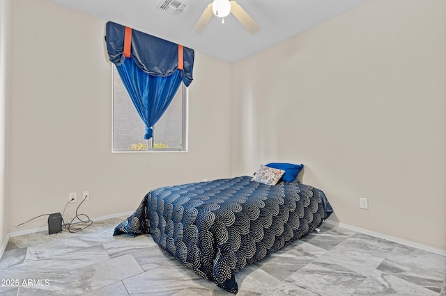 bedroom featuring ceiling fan