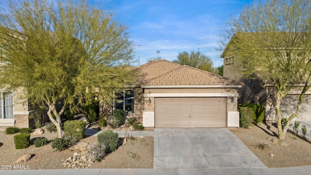 view of front of property with a garage