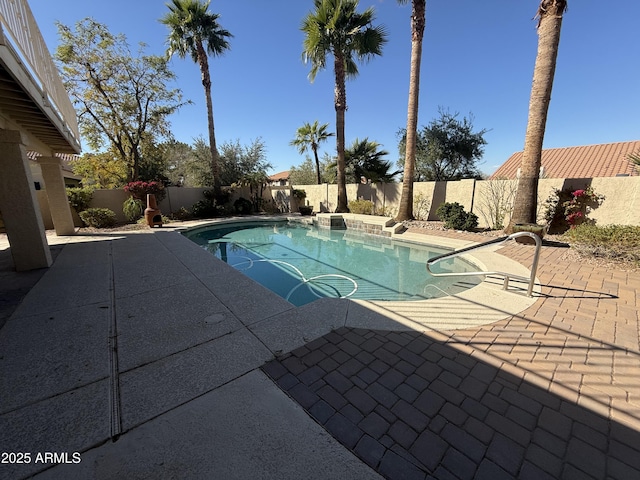 view of swimming pool with a patio, a fenced backyard, and a fenced in pool