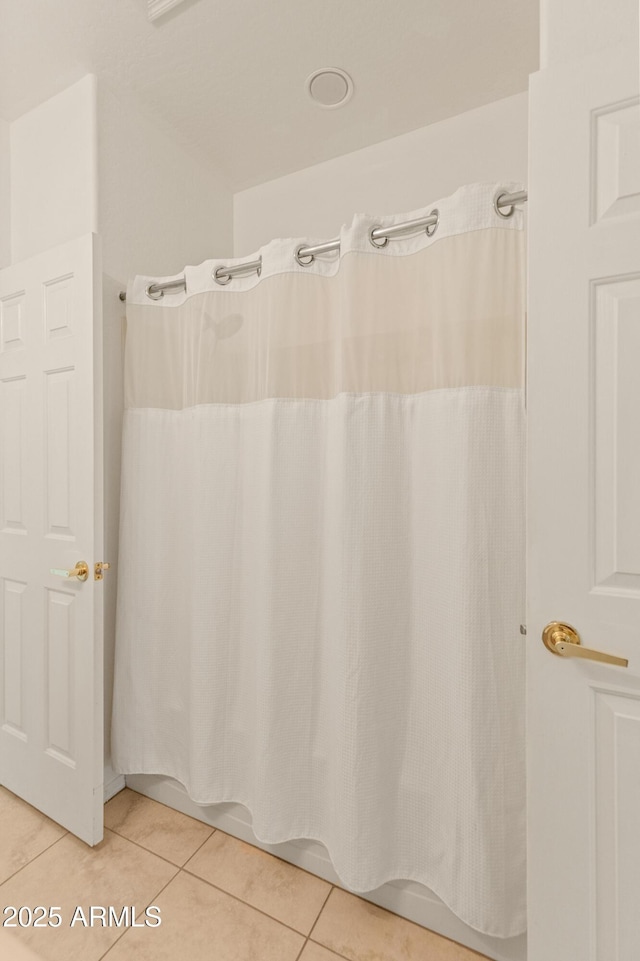 39609 N White Tail Ln, Anthem, AZ 85086 - bathroom with a shower with curtain and tile patterned flooring