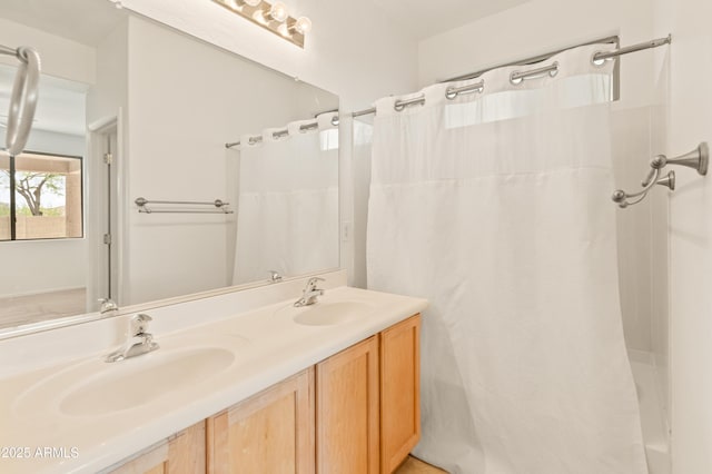 39609 N White Tail Ln, Anthem, AZ 85086 - full bathroom featuring shower / bath combination with curtain, double vanity, and a sink