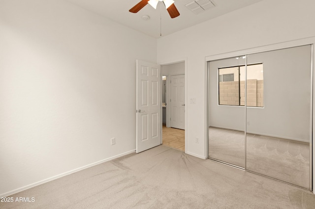 39609 N White Tail Ln, Anthem, AZ 85086 - unfurnished bedroom with a closet, ceiling fan, carpet, baseboards, and visible vents