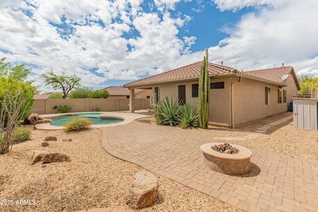 39609 N White Tail Ln, Anthem, AZ 85086 - view of swimming pool with a fire pit, a fenced in pool, a fenced backyard, and a patio