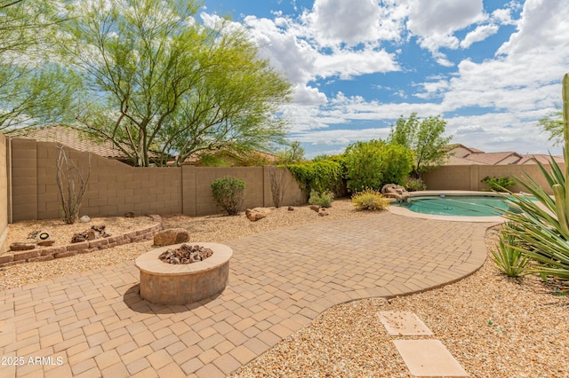 39609 N White Tail Ln, Anthem, AZ 85086 - view of pool featuring a fenced backyard, a fire pit, a fenced in pool, and a patio