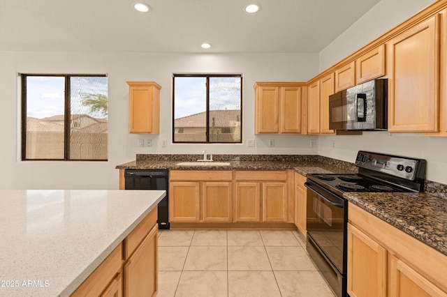 39609 N White Tail Ln, Anthem, AZ 85086 - kitchen with a sink, recessed lighting, black appliances, light brown cabinets, and light tile patterned floors