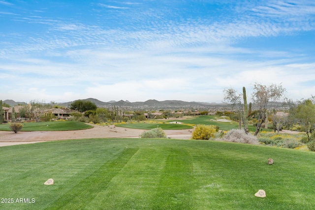 39609 N White Tail Ln, Anthem, AZ 85086 - view of property's community with a lawn, view of golf course, and a mountain view