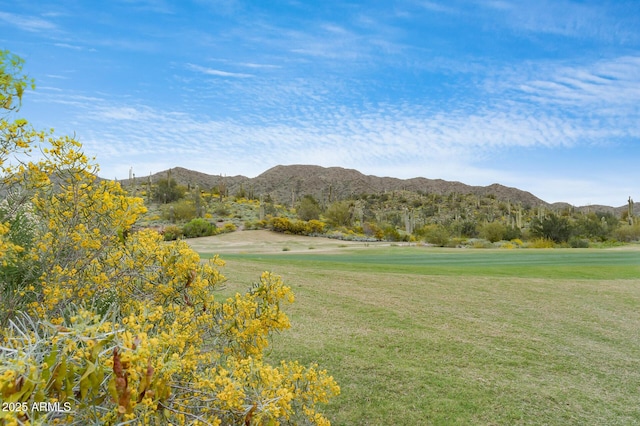 39609 N White Tail Ln, Anthem, AZ 85086 - view of community featuring a lawn, a mountain view, and golf course view