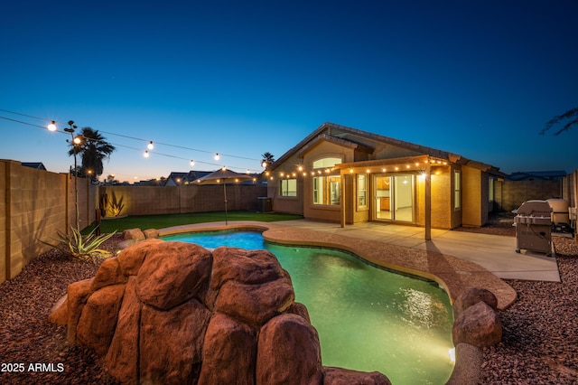 6309 W Hughes Dr, Phoenix, AZ 85043 - view of swimming pool featuring a fenced backyard, a patio, and area for grilling