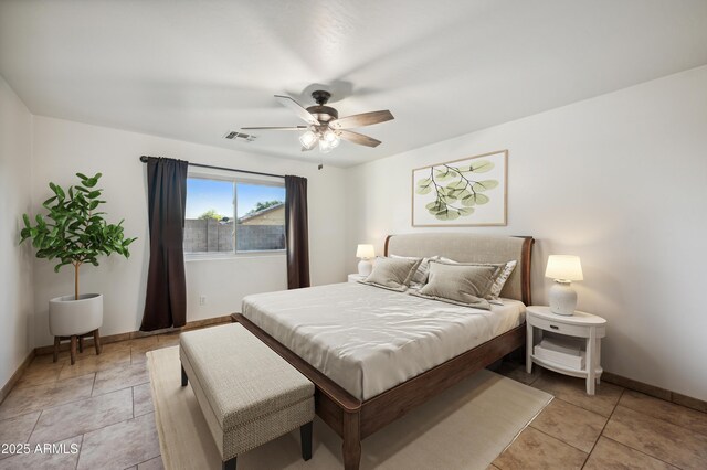 6309 W Hughes Dr, Phoenix, AZ 85043 - bedroom featuring baseboards and ceiling fan