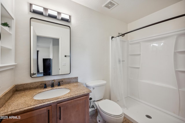 6309 W Hughes Dr, Phoenix, AZ 85043 - bathroom with toilet, vanity, and a shower with curtain