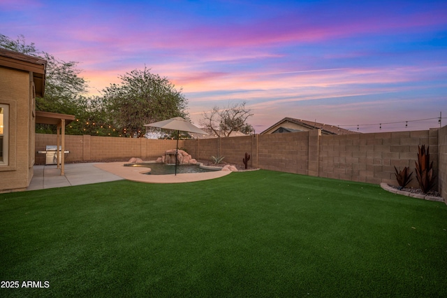 6309 W Hughes Dr, Phoenix, AZ 85043 - view of yard with a patio