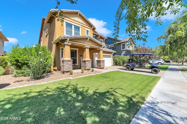 view of front of home featuring a garage, a porch, and a front lawn