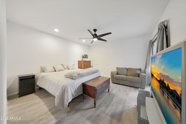 bedroom featuring ceiling fan and light wood-type flooring