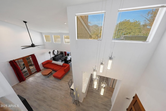 interior space featuring ceiling fan and hardwood / wood-style floors