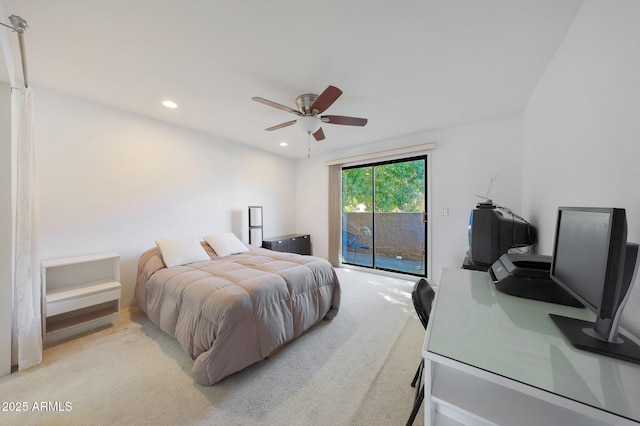 bedroom with ceiling fan, light carpet, and access to outside