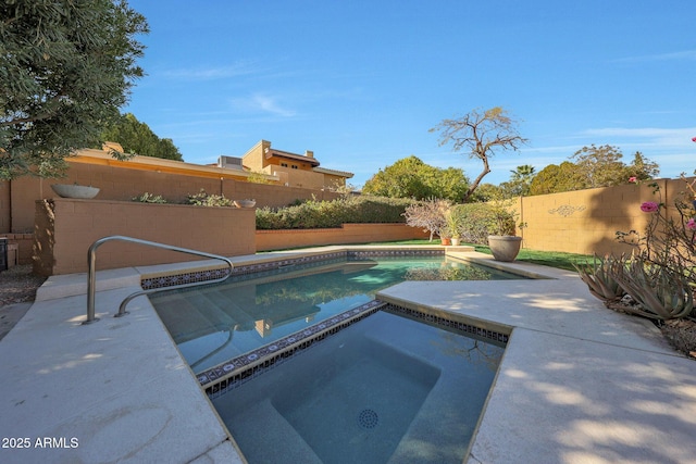 view of pool featuring an in ground hot tub and a patio area