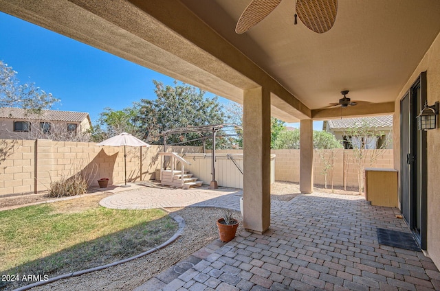 view of patio / terrace featuring ceiling fan