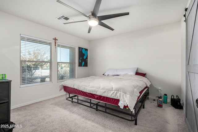 bedroom with ceiling fan and carpet flooring